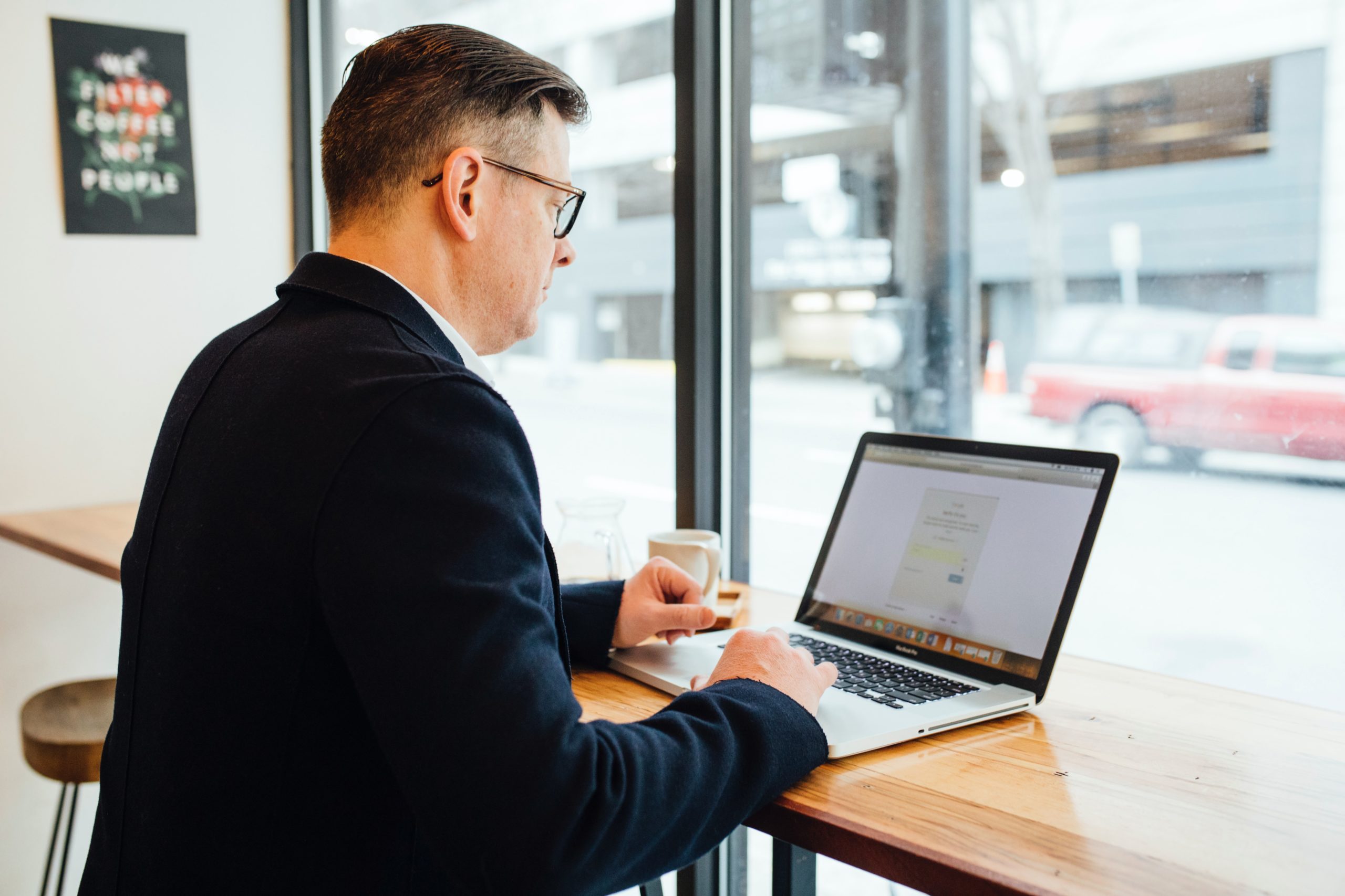 Finance Man at Laptop